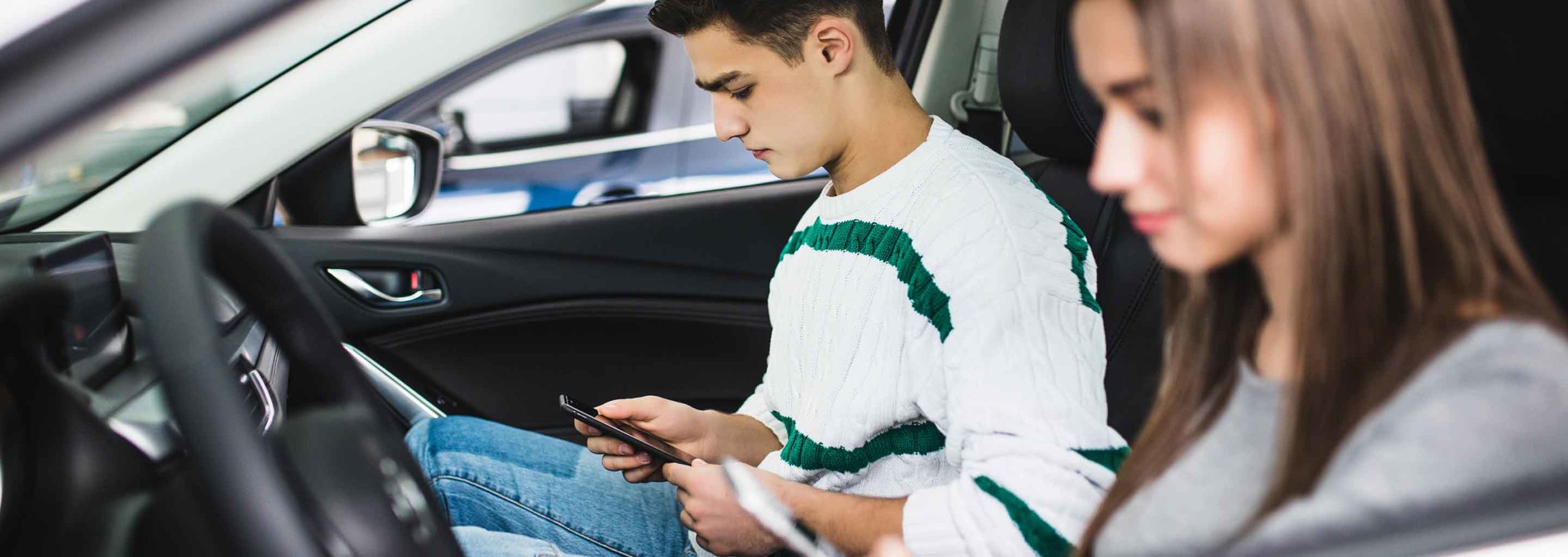 students in car