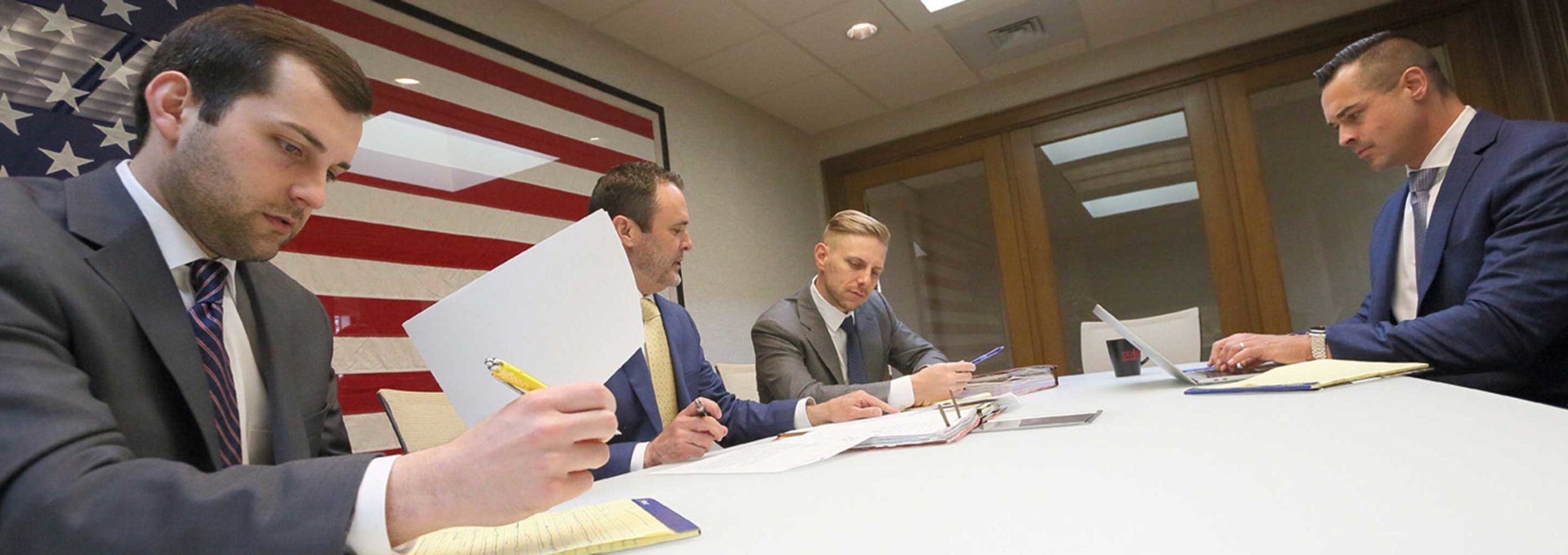 attorneys working at table