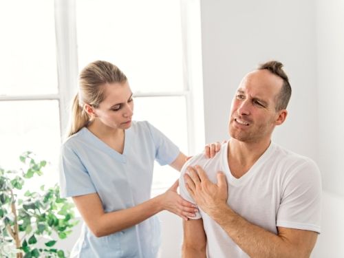 Man with injured shoulder