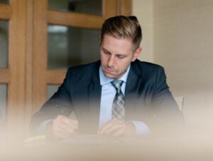 Wichita personal injury attorney, Jesse Tanksley working on an accident case