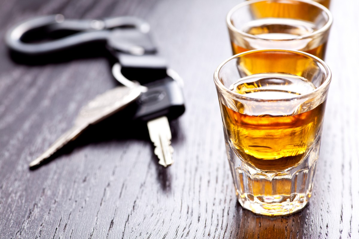 Shot glasses and keys on a table