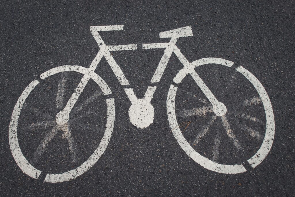 White bicycle lane road marking